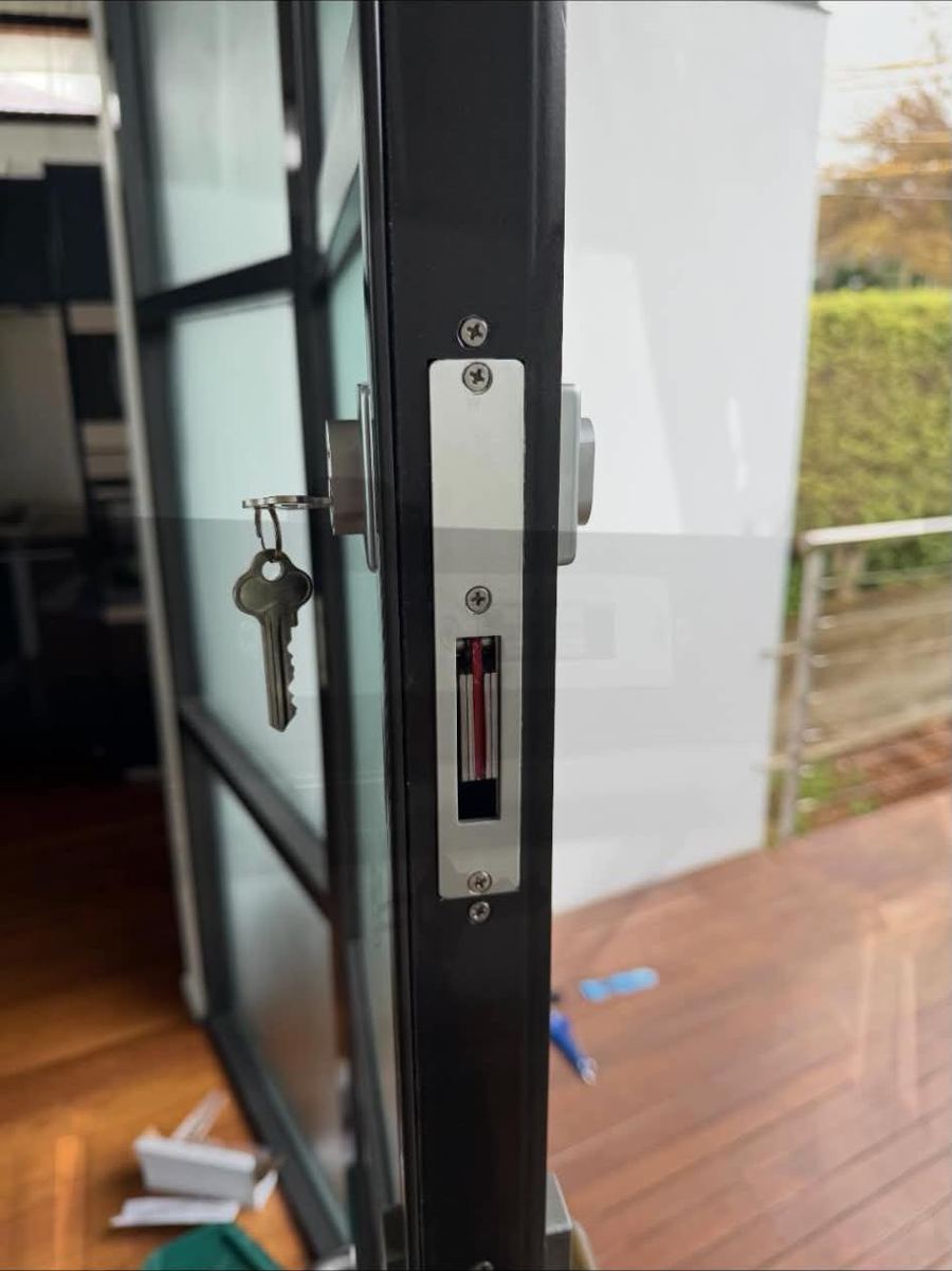 Mortice lock installed in an aluminium framed door