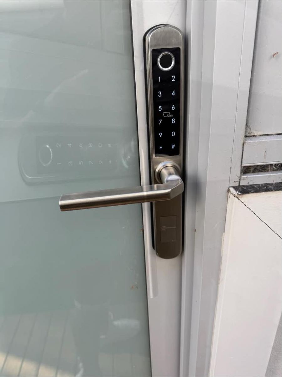 Slimline smart lock on a glass door